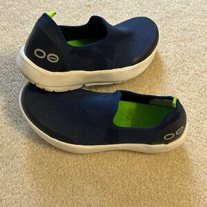 Women’s Oofos slip on sneakers